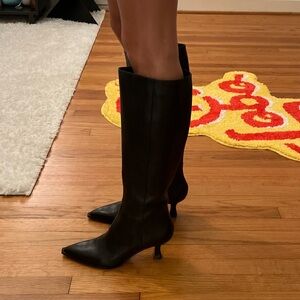 Knee high black boots